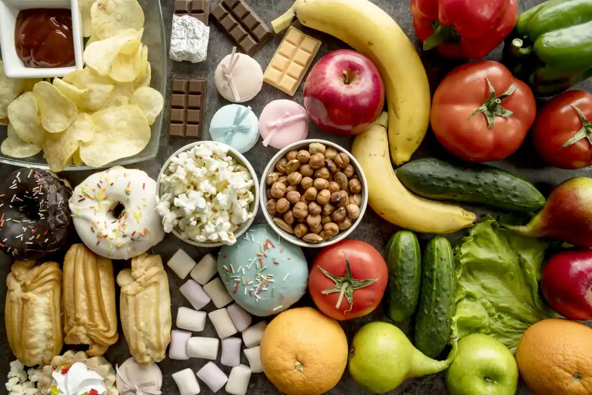 Assortment of food arranged from unhealthy to healthy