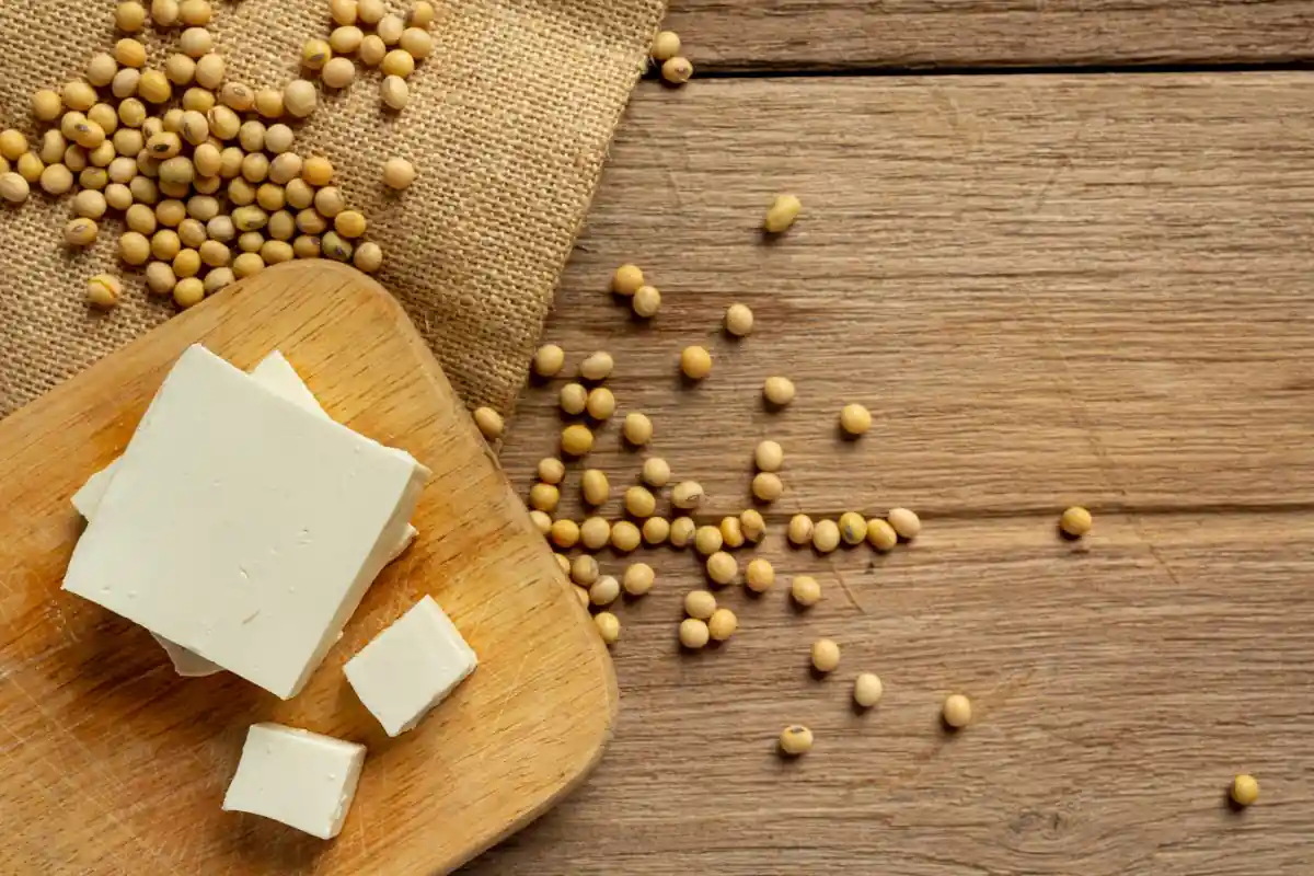 Soy beans and tofu on a wood table